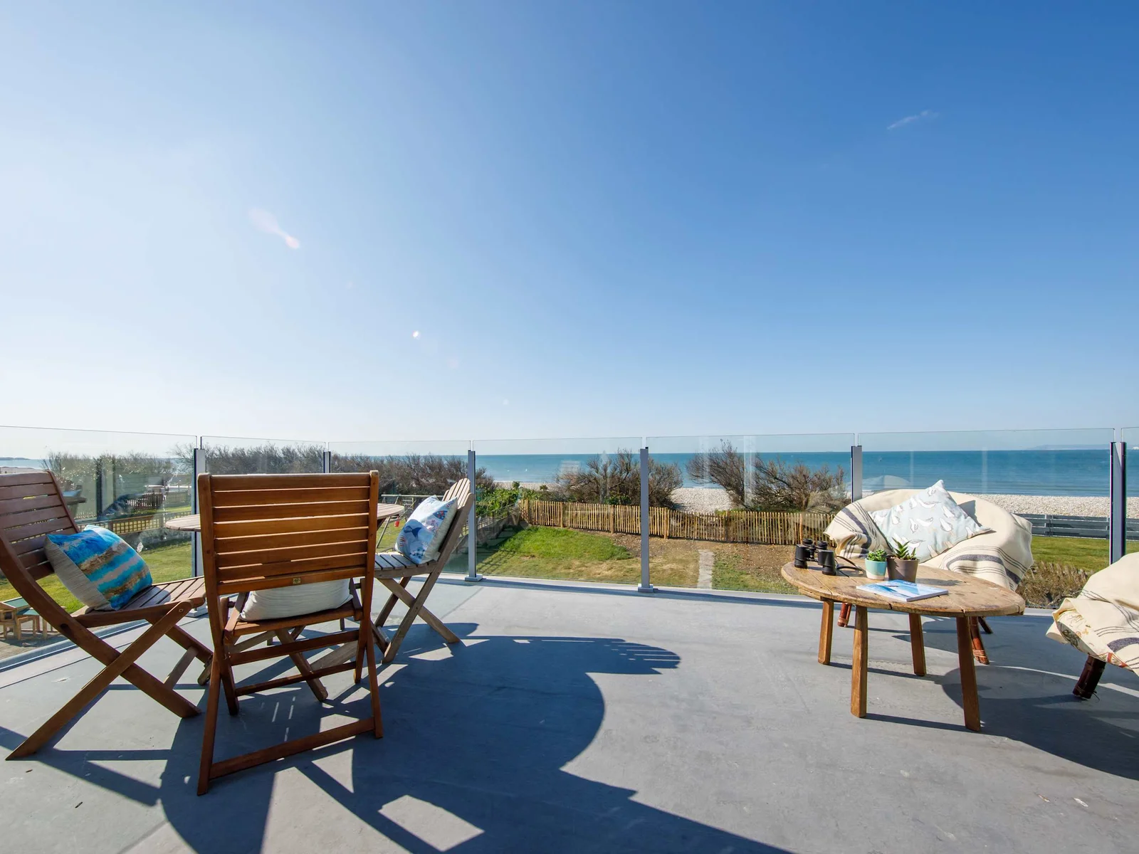 Work on your tan while relaxing on the balcony