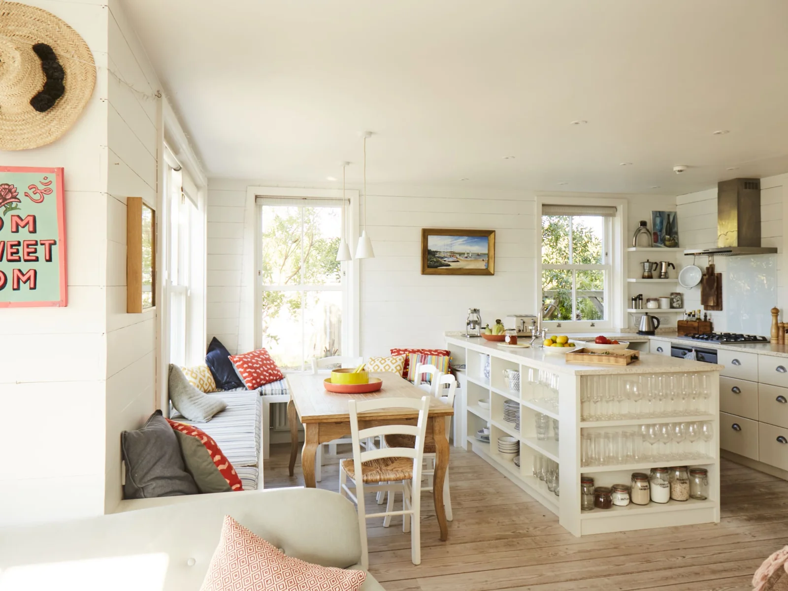 Bright and airy kitchen with a cozy dining area, perfect for family meals and gatherings