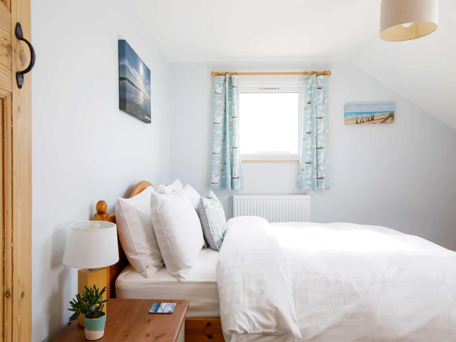 Close the curtains and sleep a bit longer or let the first sunlight wake you up