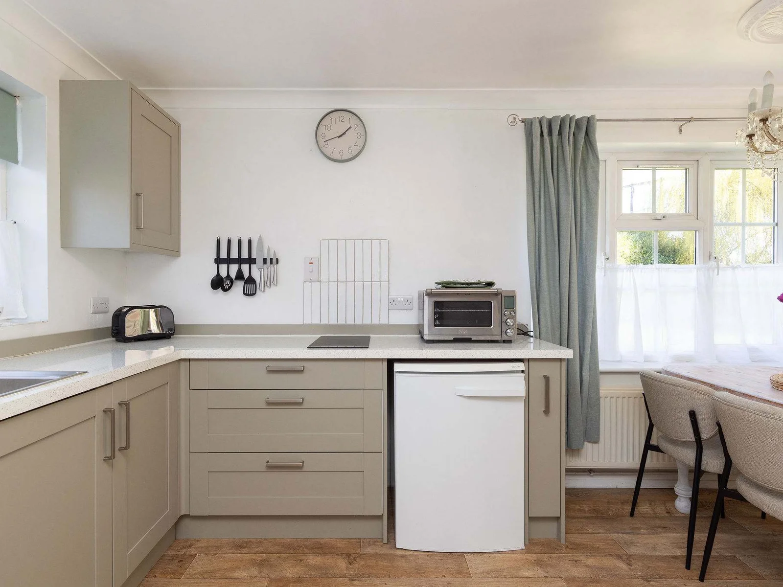 Open-plan living and dining create a practical, stylish base for couples or small families.
