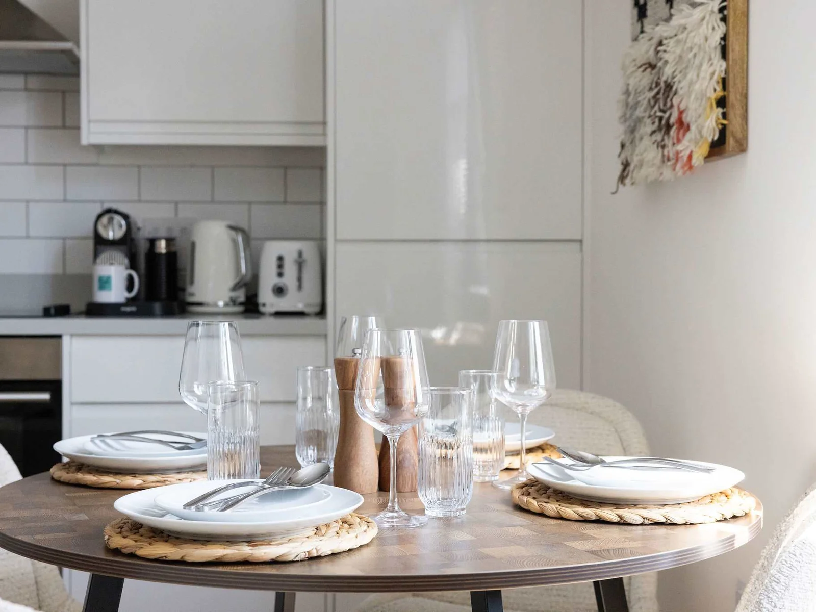Stylish dining area beside the modern kitchen, perfect for relaxed meals and morning coffee.