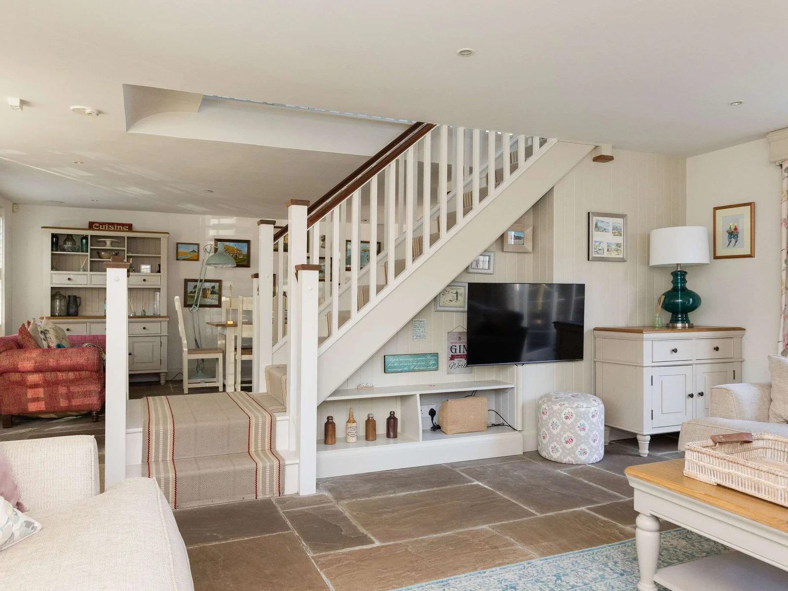 Spacious open-plan layout connecting living, dining and kitchen areas