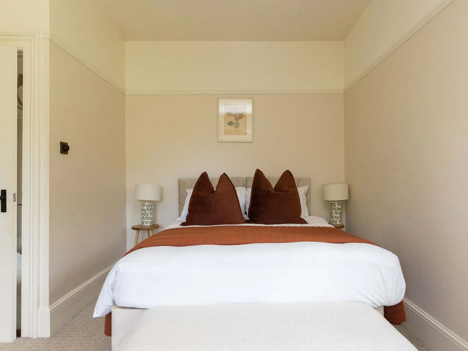 Warm and inviting bedroom with a peaceful atmosphere.