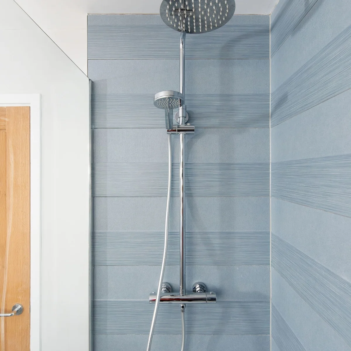 There is a walk-in shower, stocked with essentials and fresh towels.