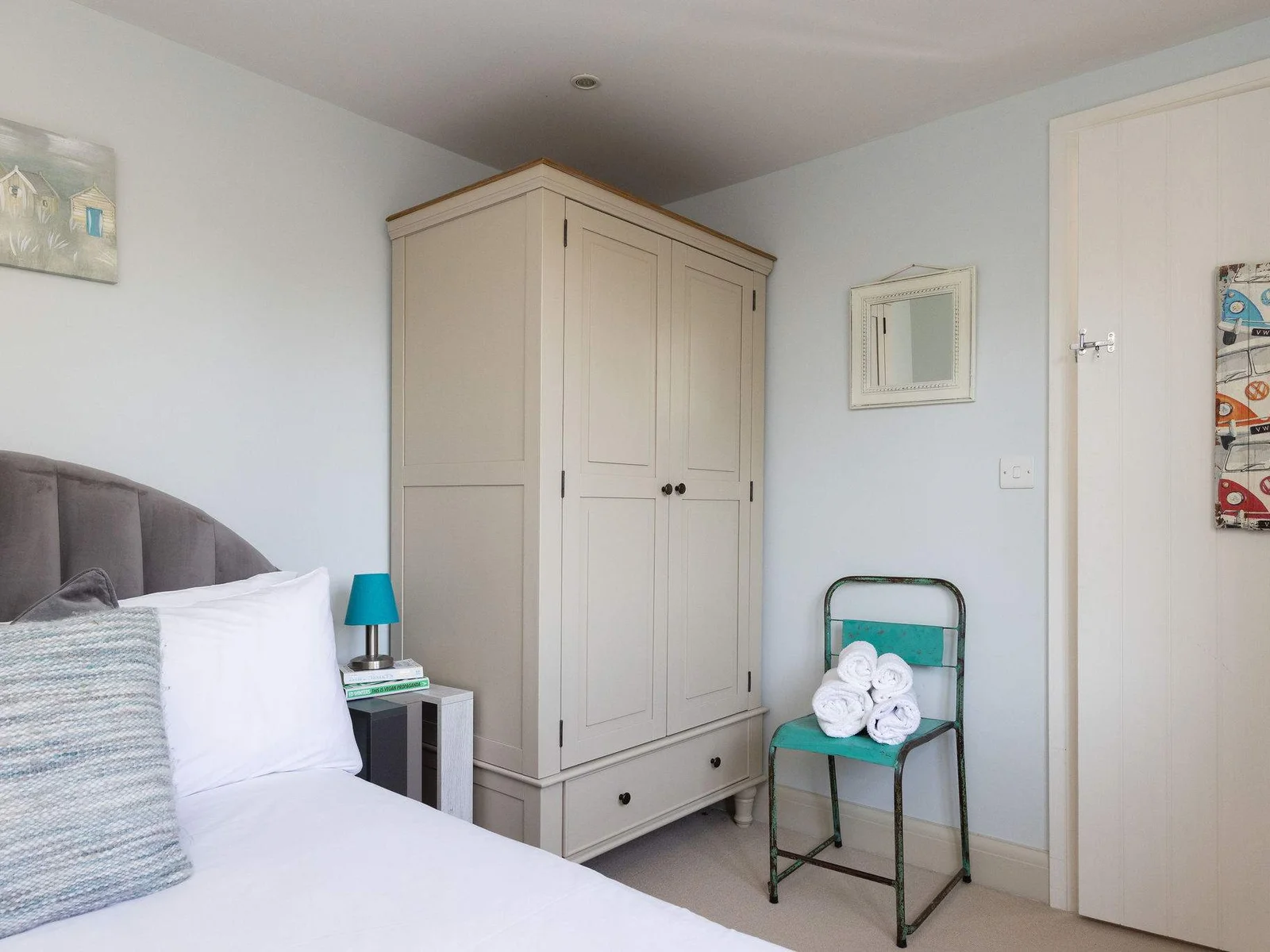 Calm, comfortable space with storage and natural light