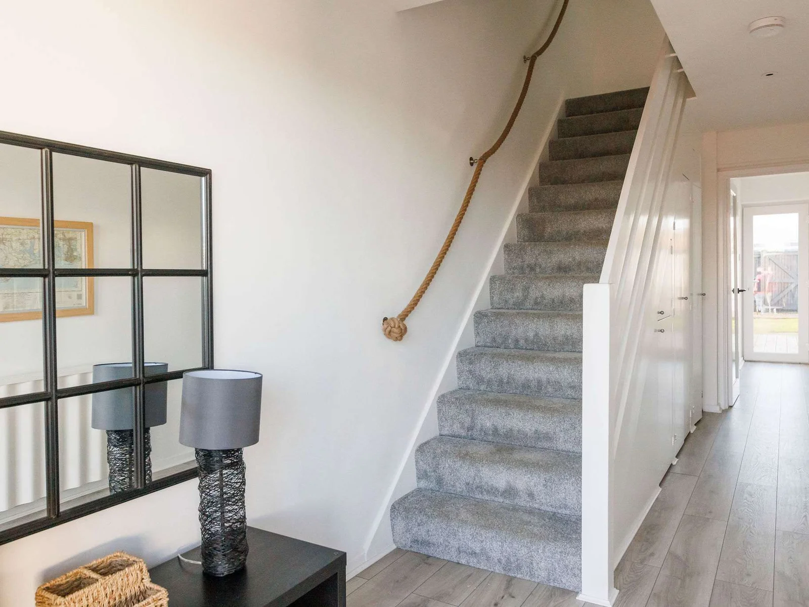 Bright, modern entrance with nautical charm