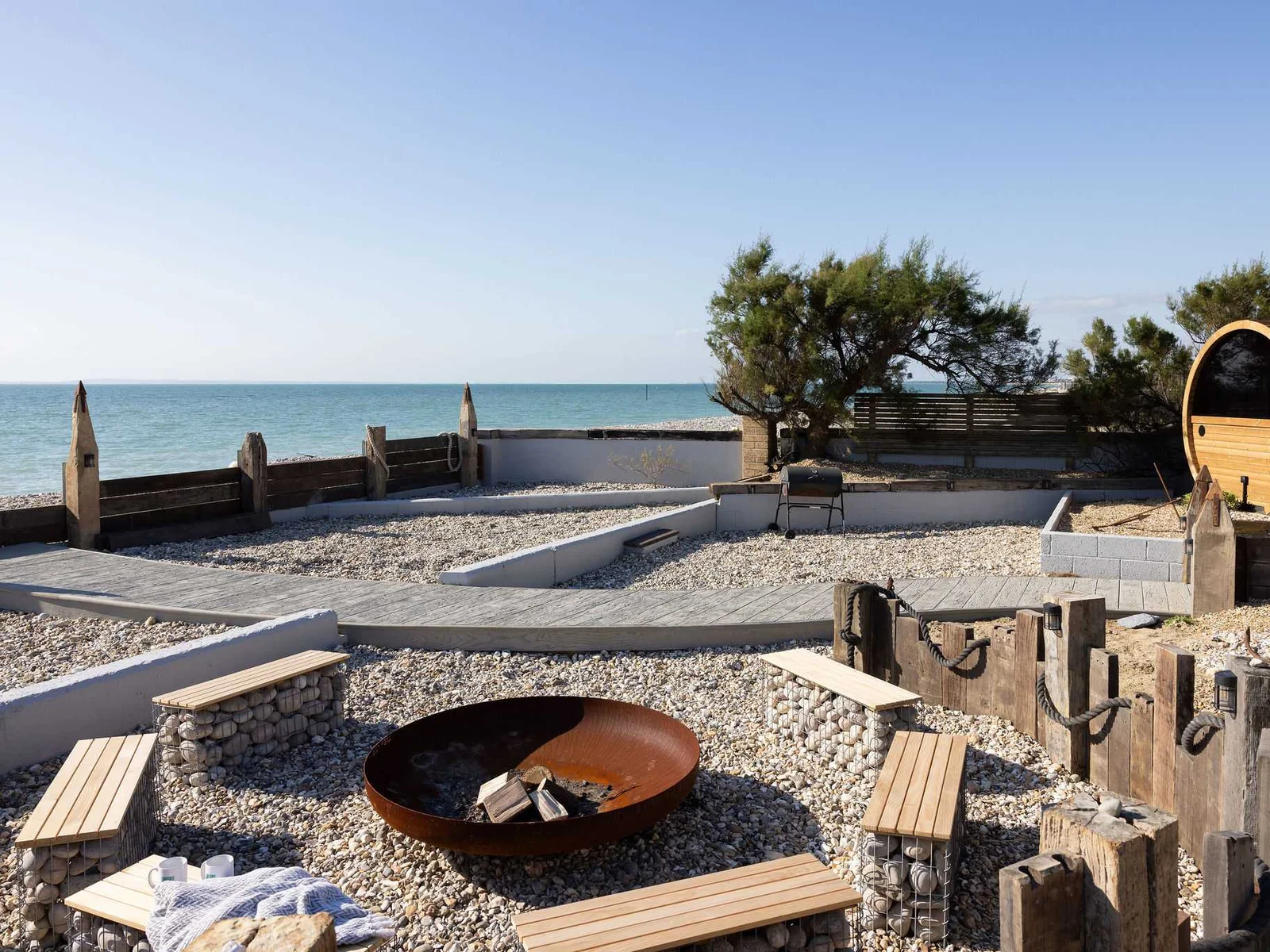 Gather round the fire pit as evening approaches to watch incredible sunsets while chatting with your loved ones.