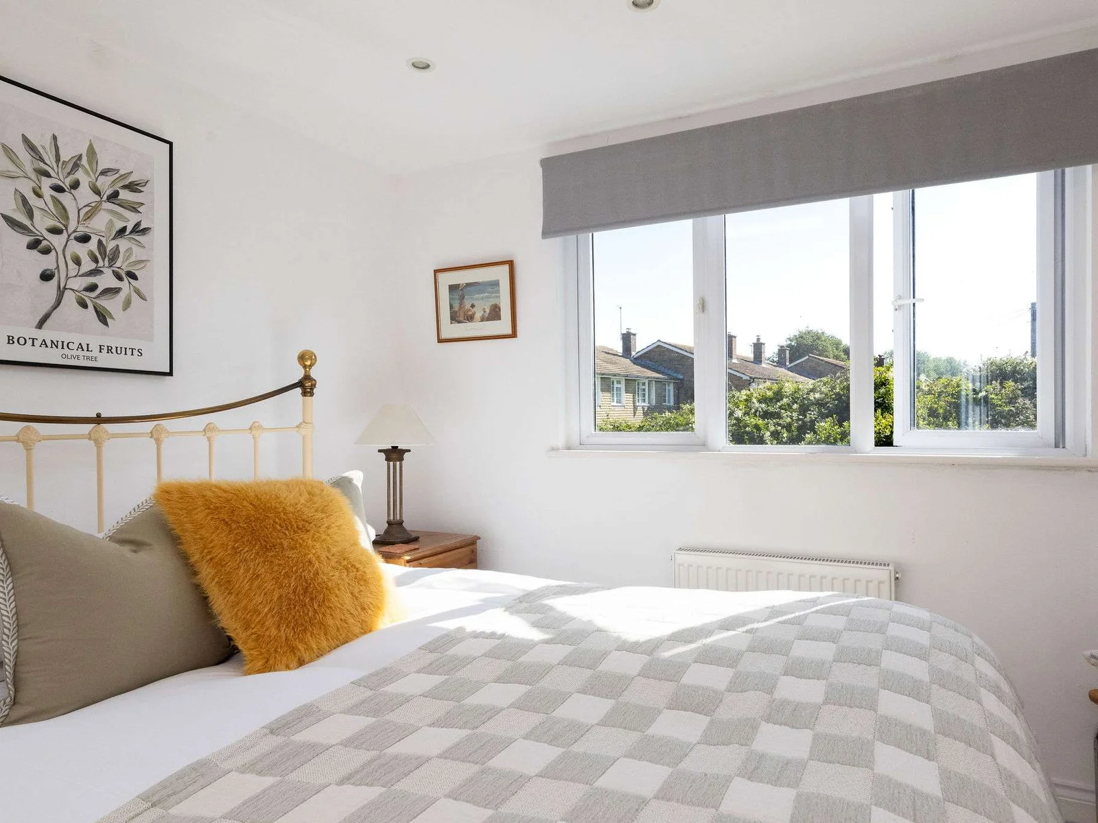 Unwind in this bright and cosy bedroom offering pleasant views at our holiday home.