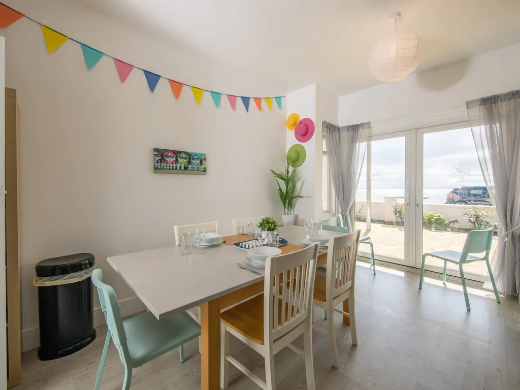 Absolute Beachfront with Decked Garden Oasis and Views