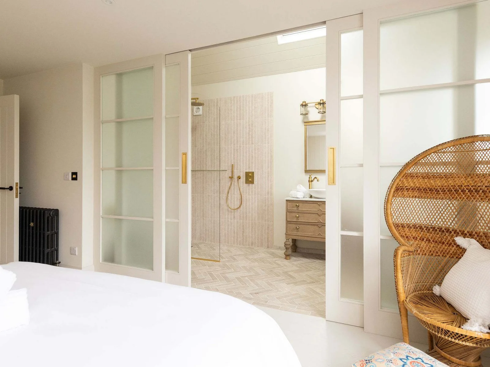 Your private sanctuary, where the bedroom opens into a stunning walk-in shower.