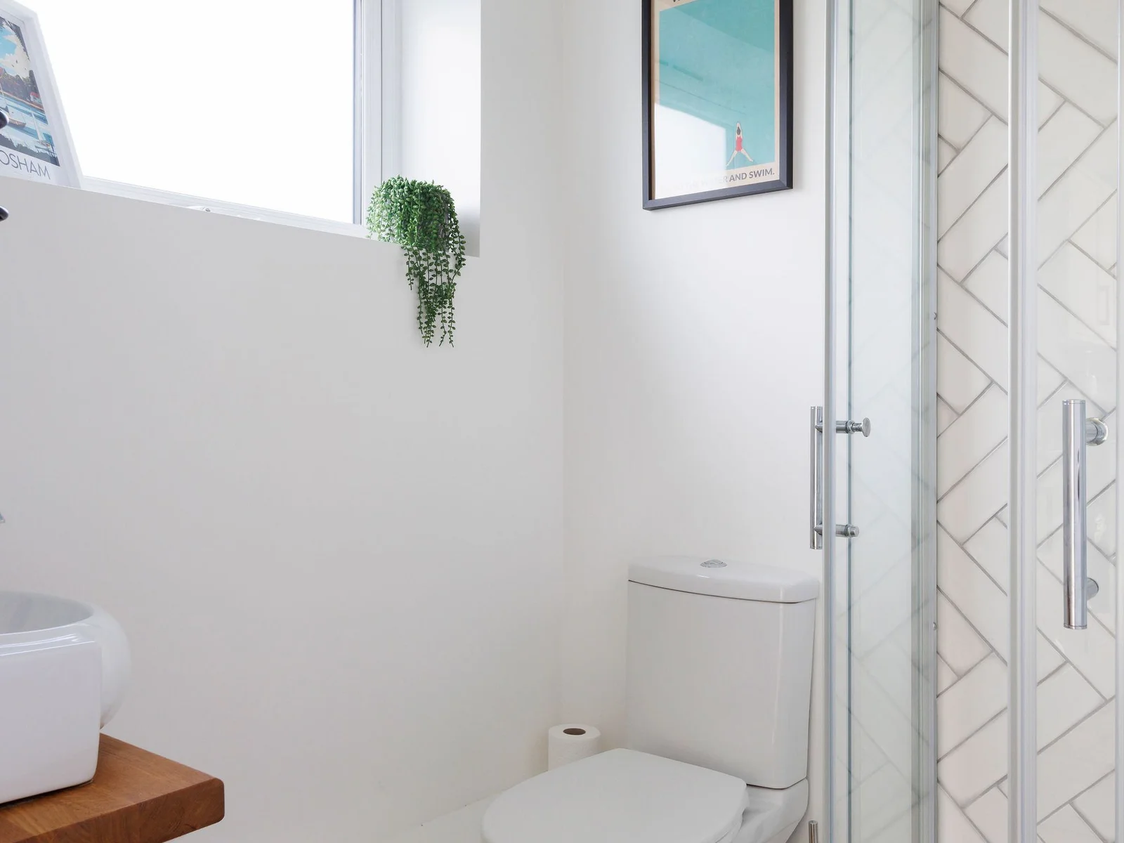 There is also a handy downstairs shower with WC and sink.