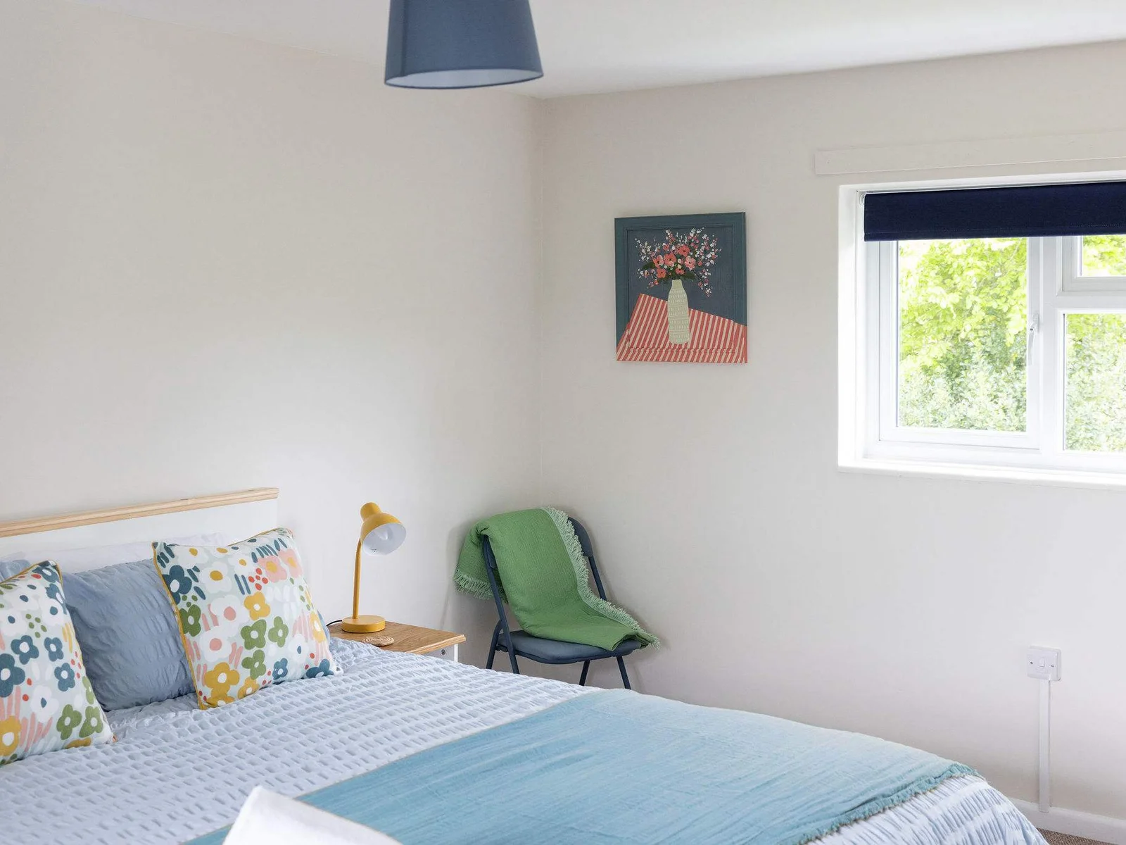 Cosy corners and dreamy decor. This bedroom is the perfect little retreat