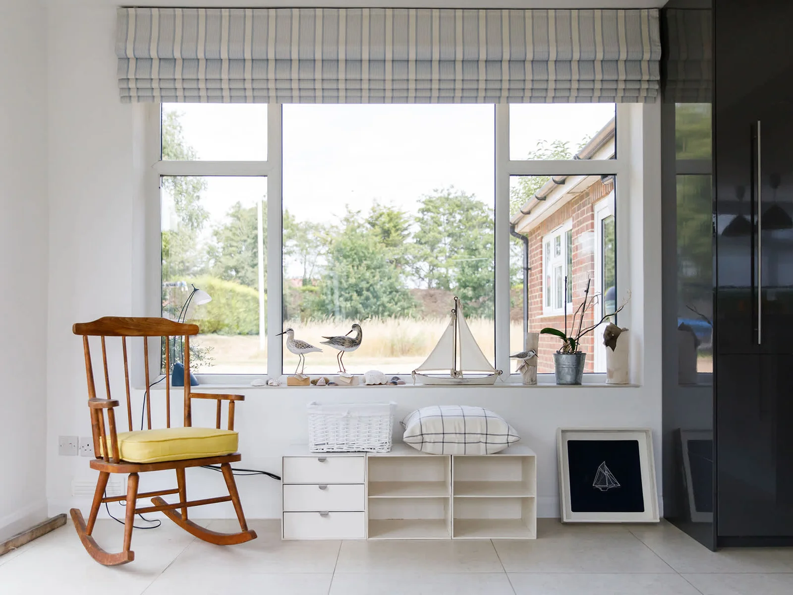 The large windows allow plenty of natural light into the house.