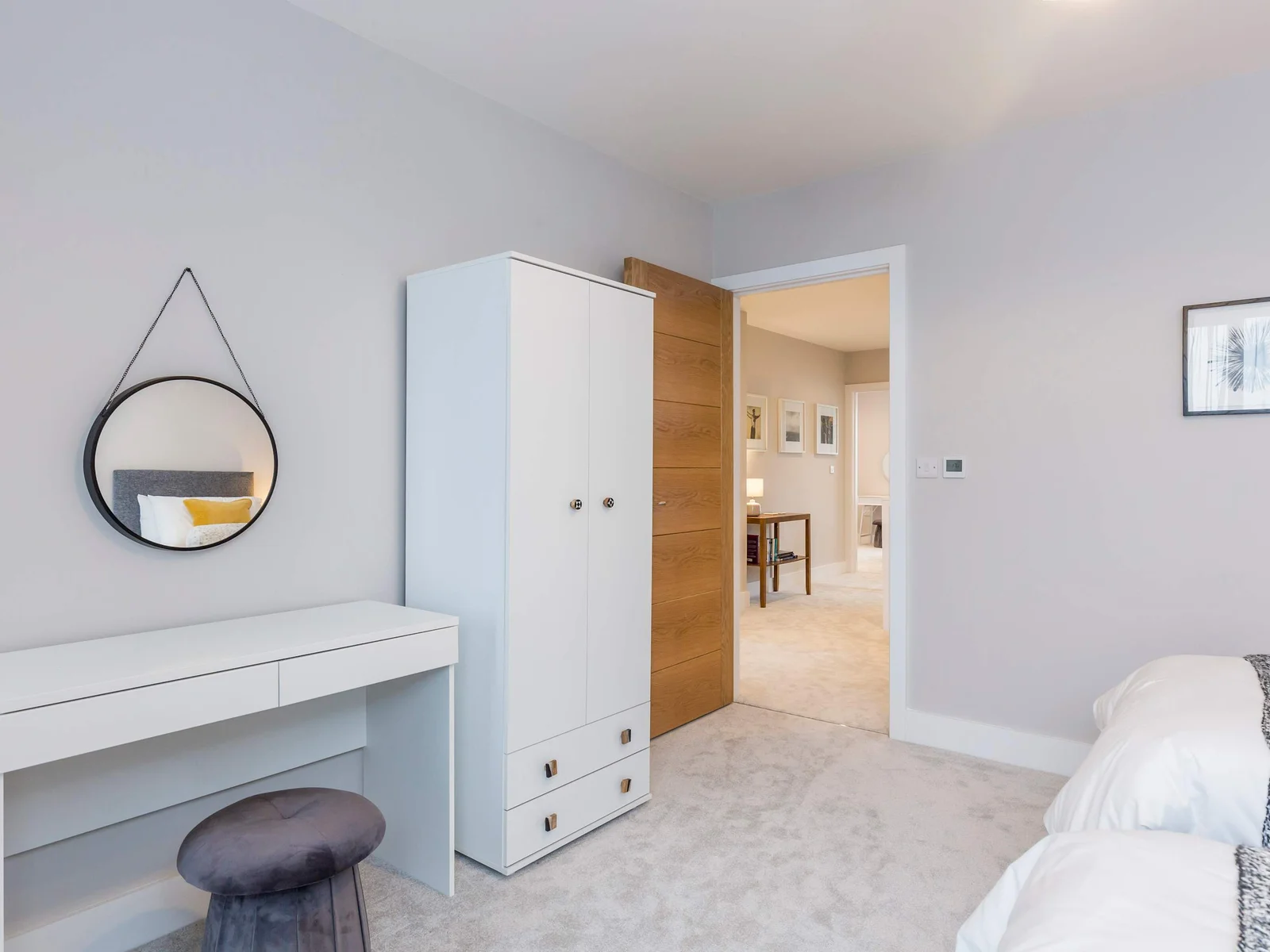 Storage and a make up table in the twin room