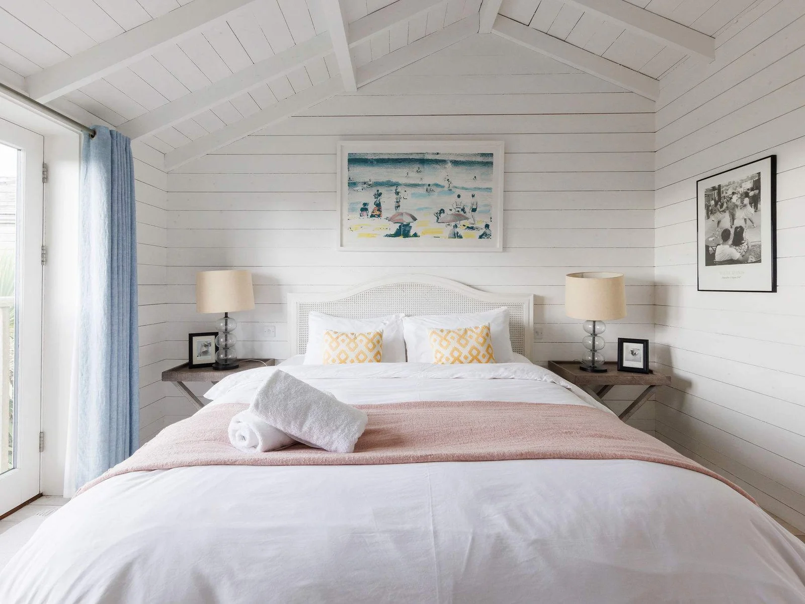 Vaulted ceilings and art deco touches make this a dream master bedroom!