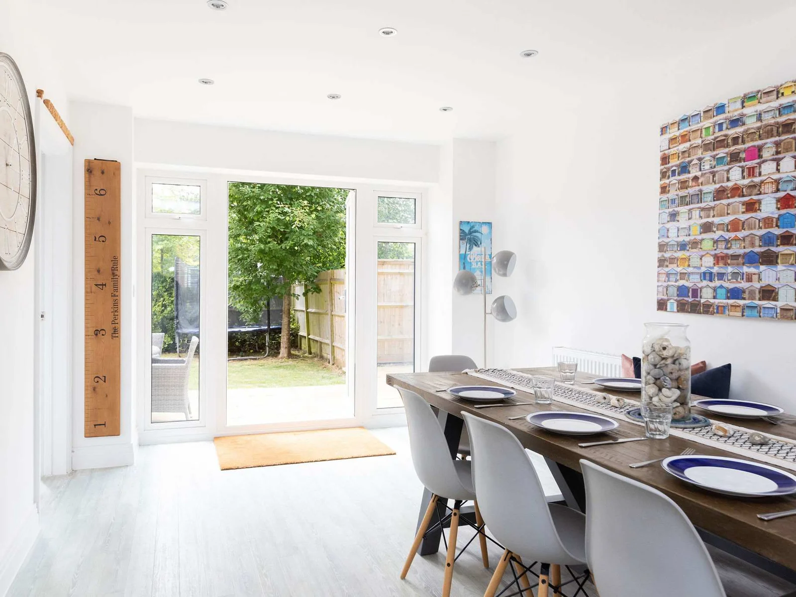 Open up the patio doors on warmer days to connect the dining space to the garden.
