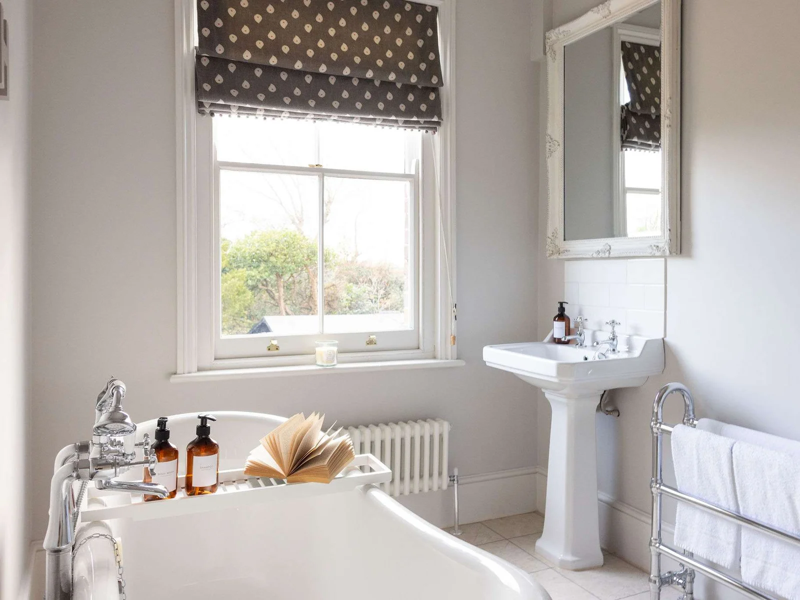 Classic family bathroom with bright and airy styling.