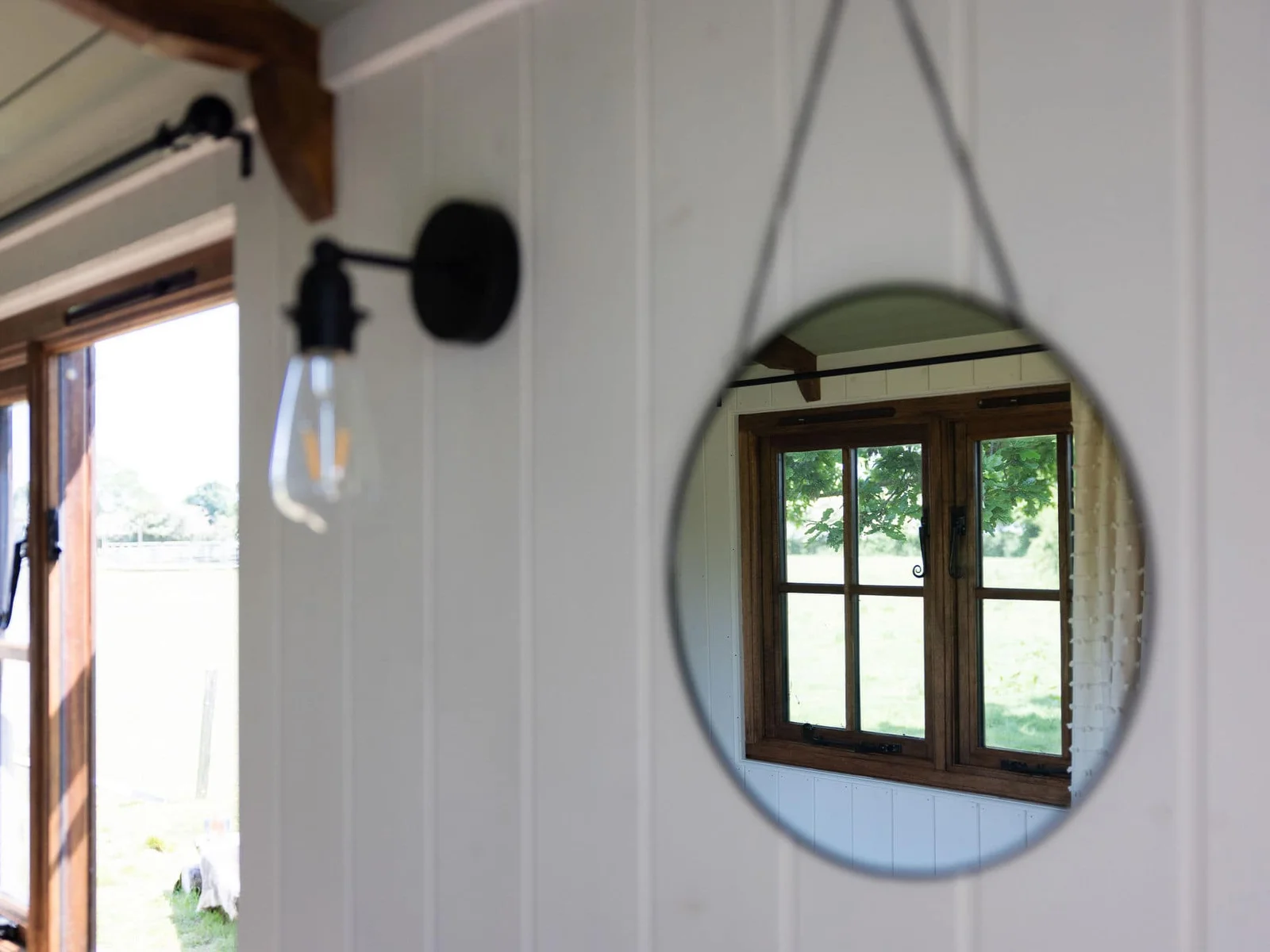 Mirrors reflect the morning light into the hut