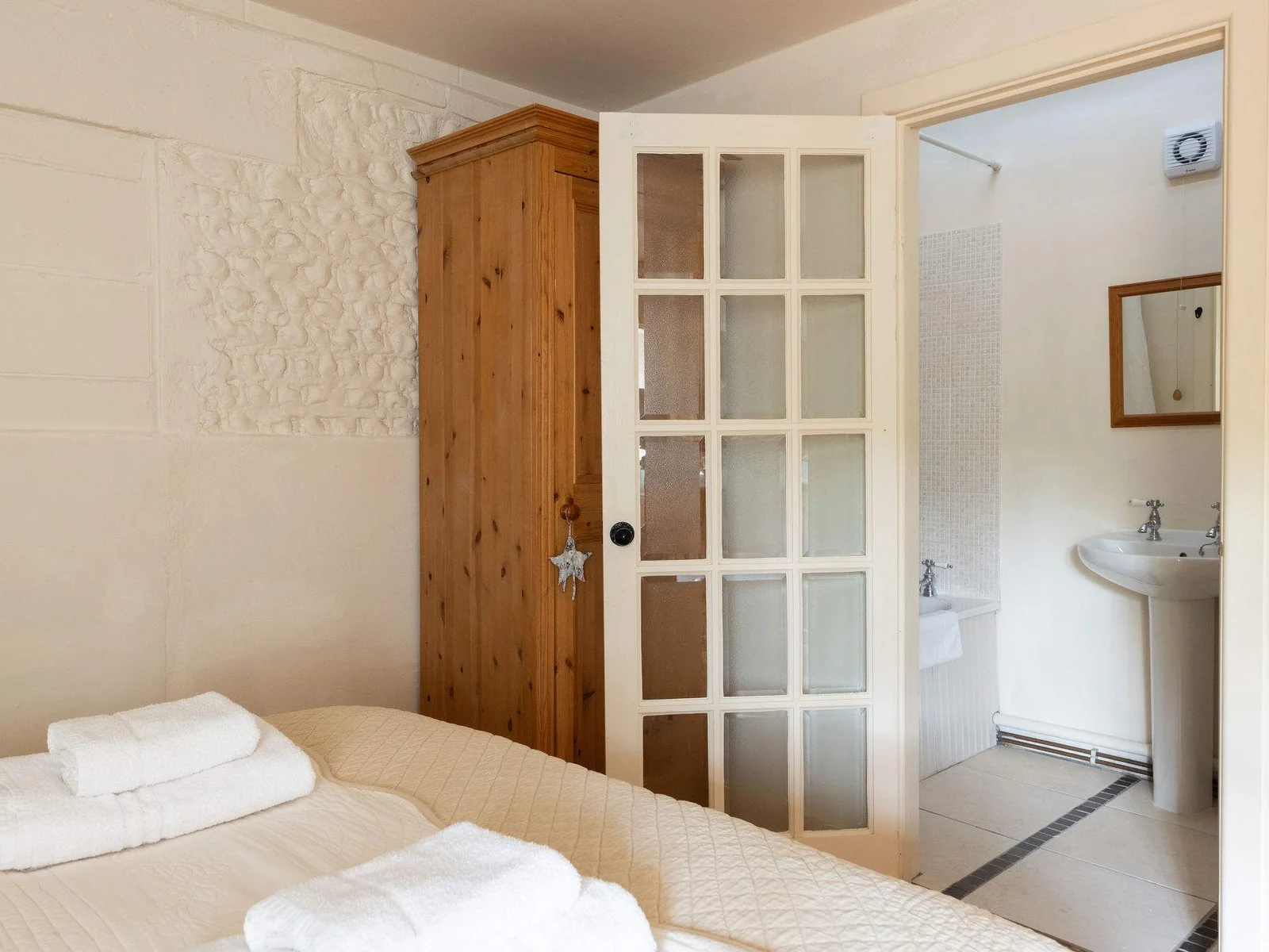 The master king in The Dairy has a handy ensuite with shower, tubby tub (short bath), WC and sink.