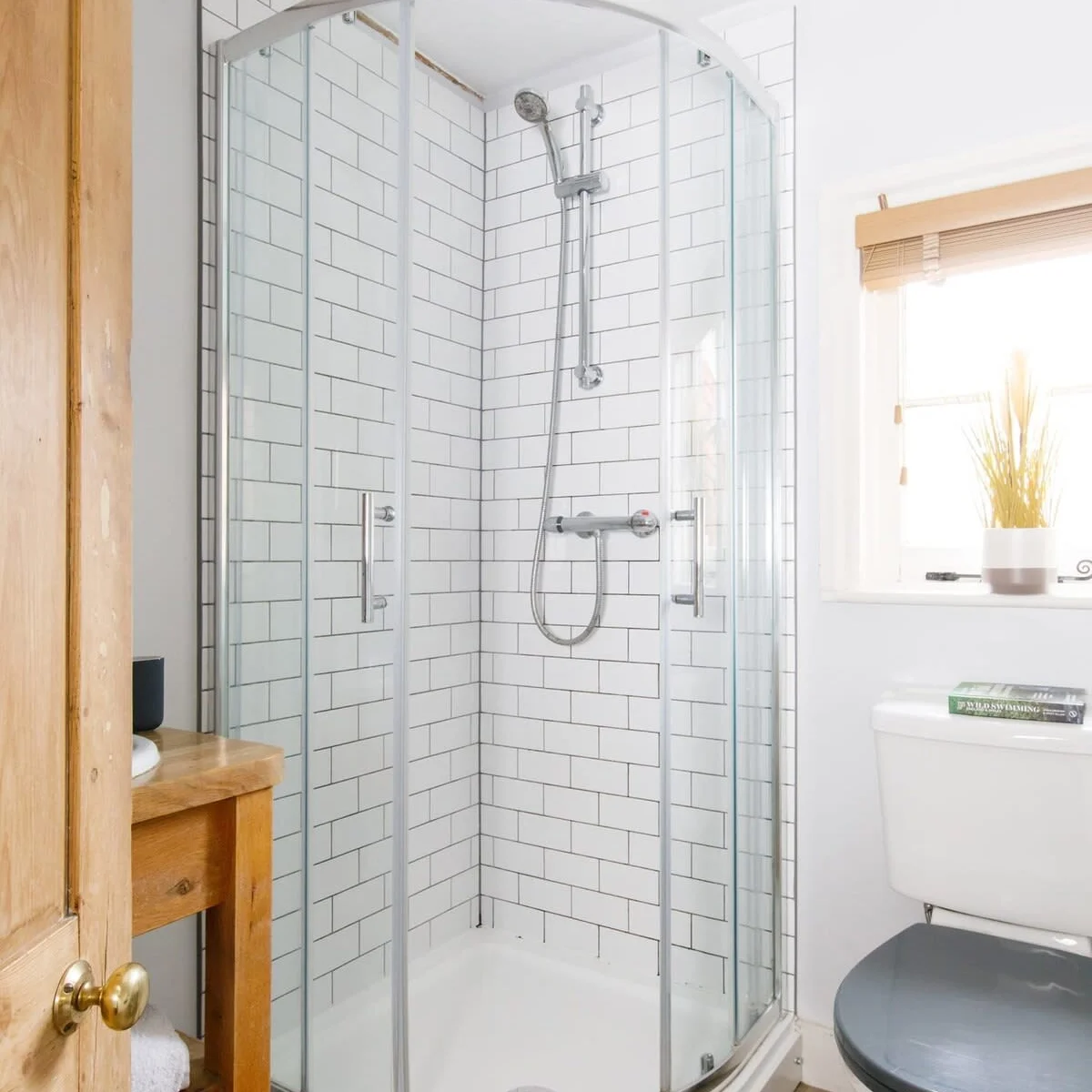 There is a separate, free standing shower.