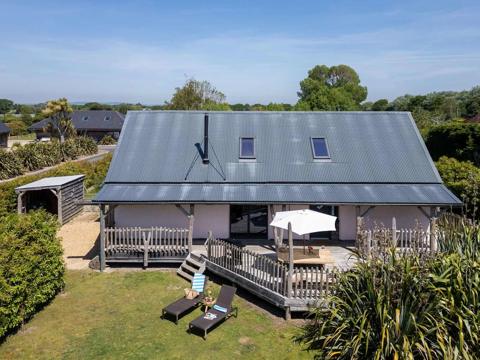 A secluded countryside hideaway with sunny decking, just minutes from the coast.