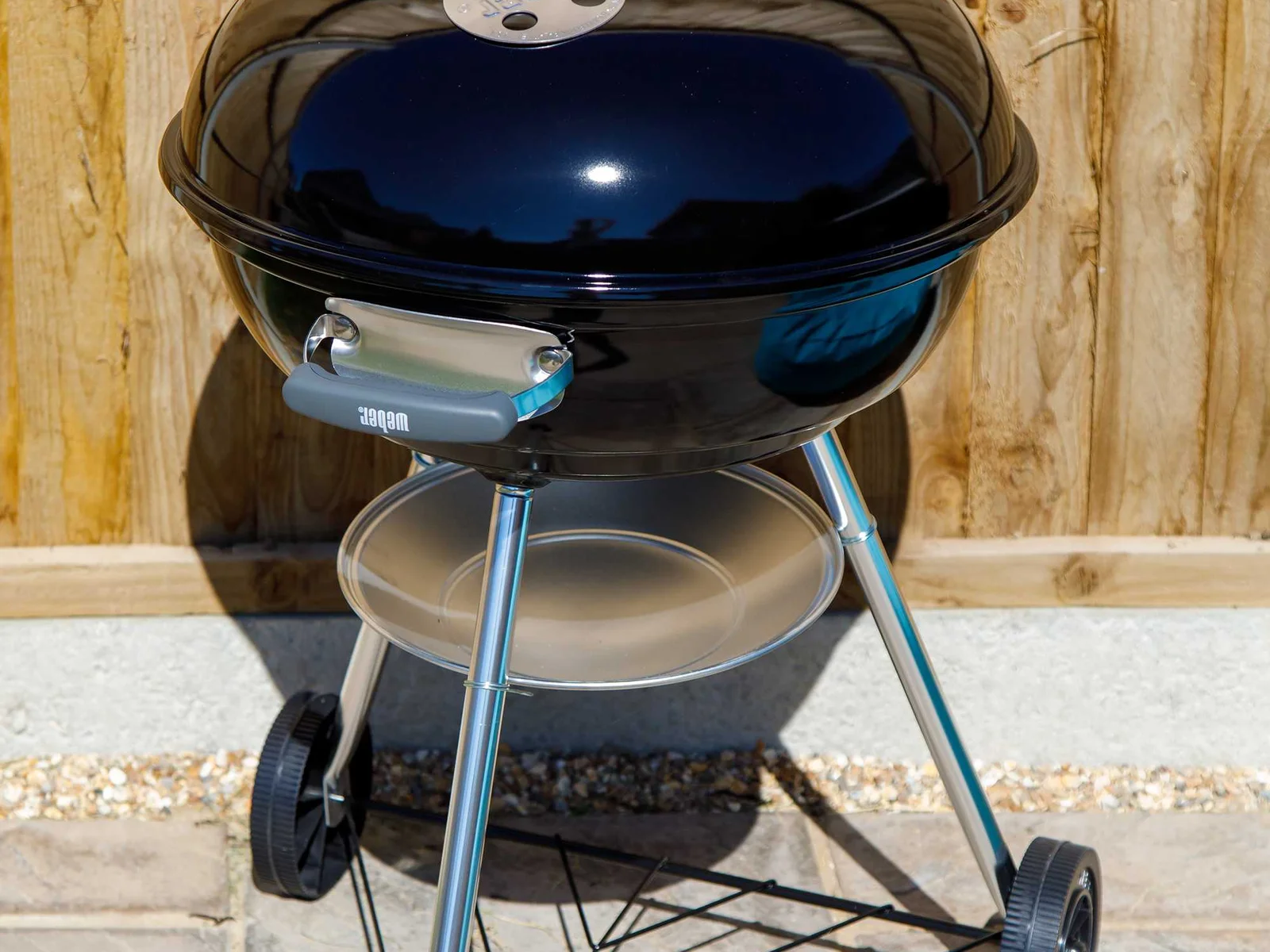 The home has a charcoal BBQ.