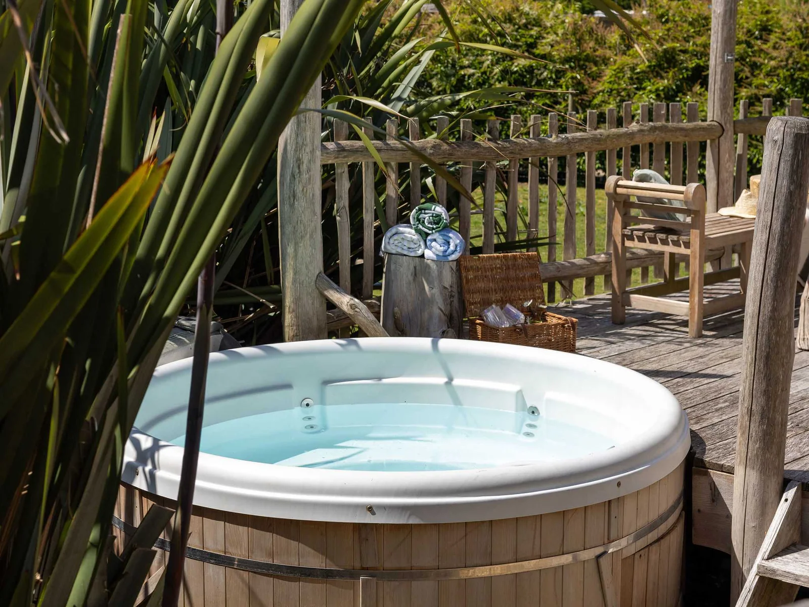Bubble away your cares in your very own private hot tub under open skies.