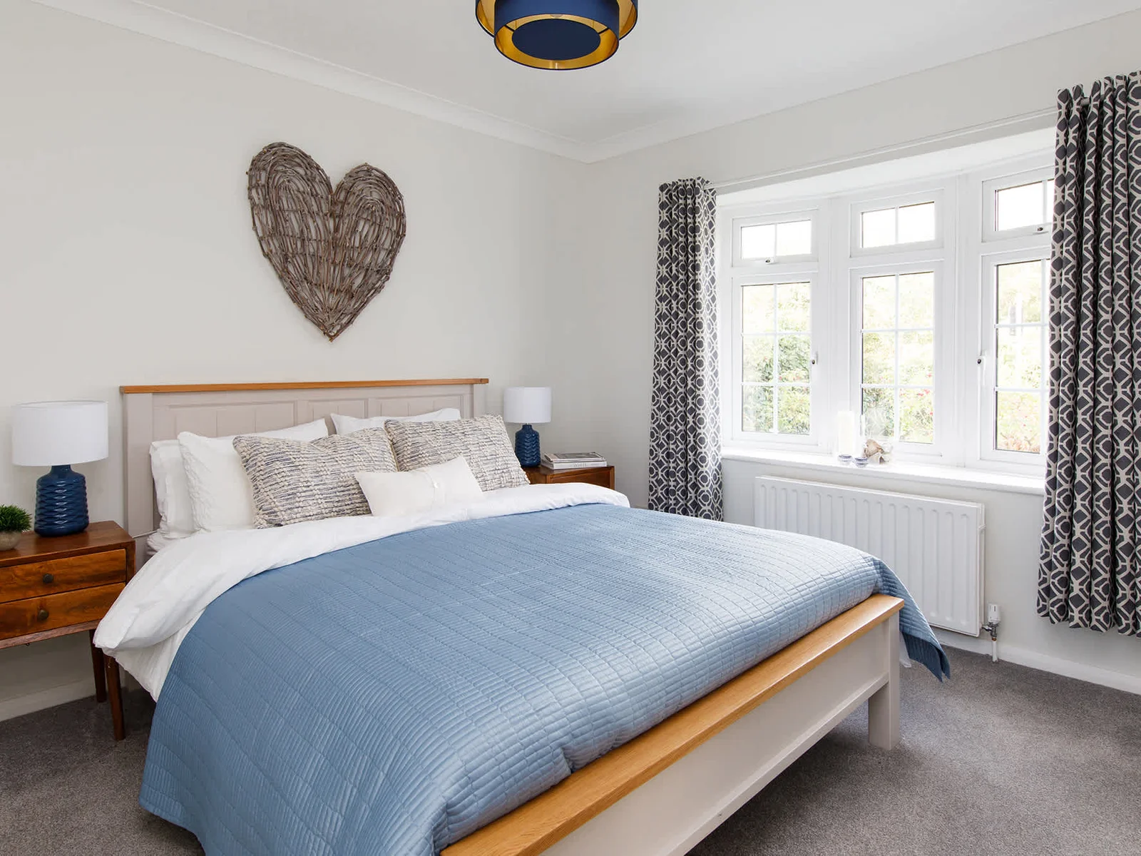 The inviting downstairs king room is beautifully decorated.