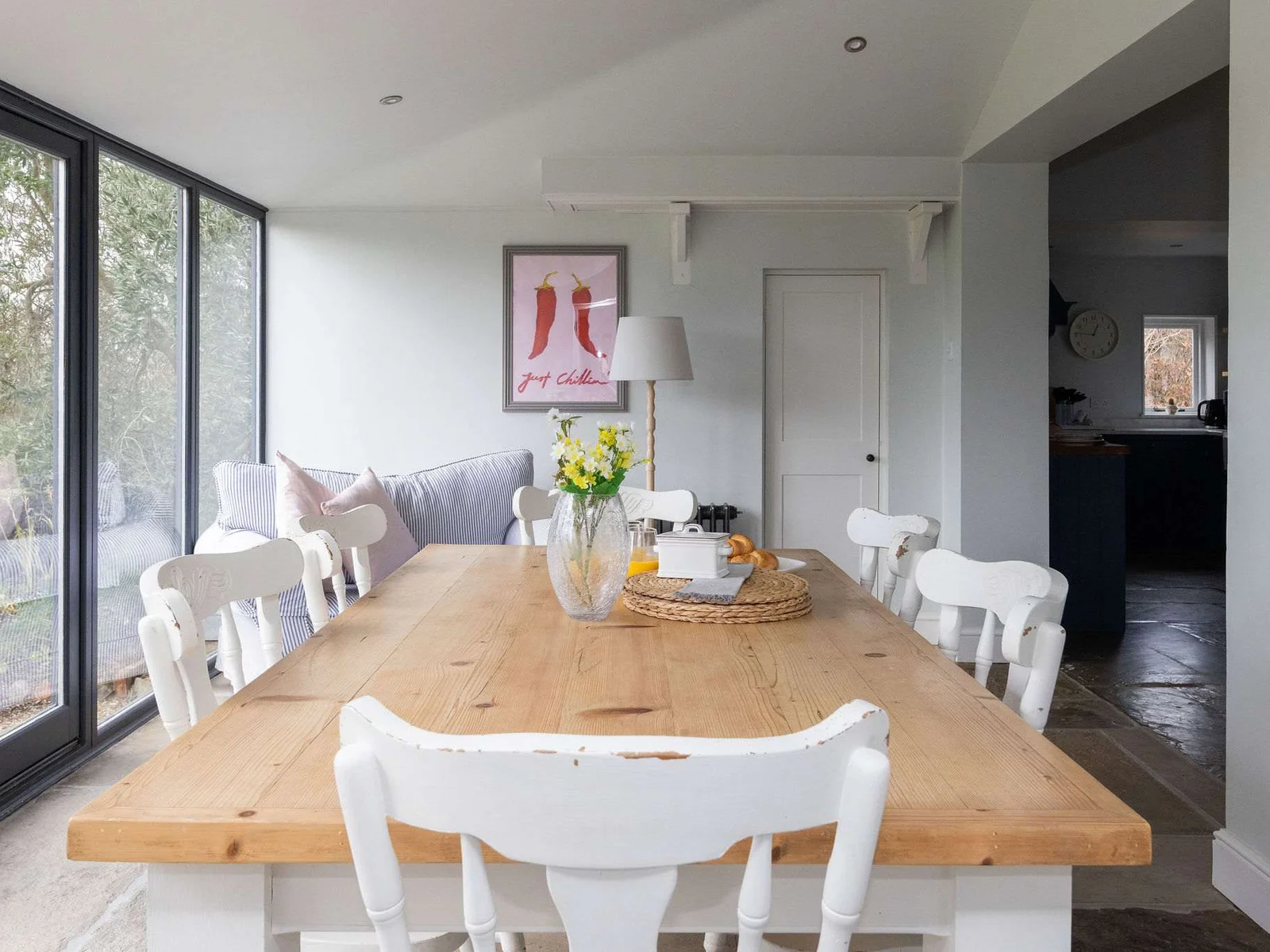 Bright dining area overlooking the peaceful garden.