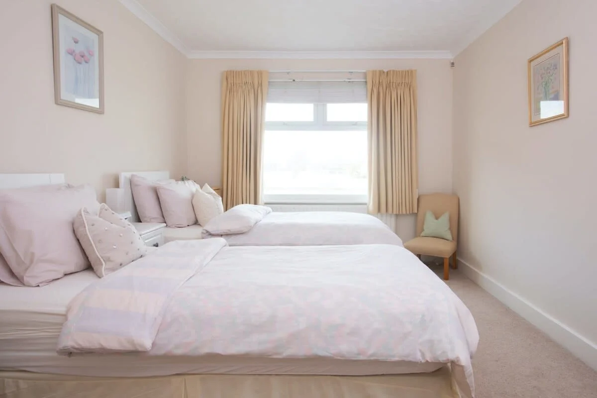 Ground floor twin bedroom with shower en-suite.