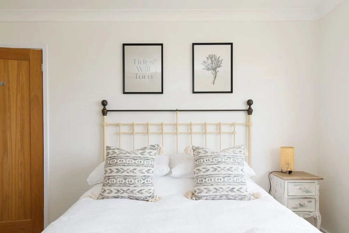 A light and airy master room with a rustic feel.