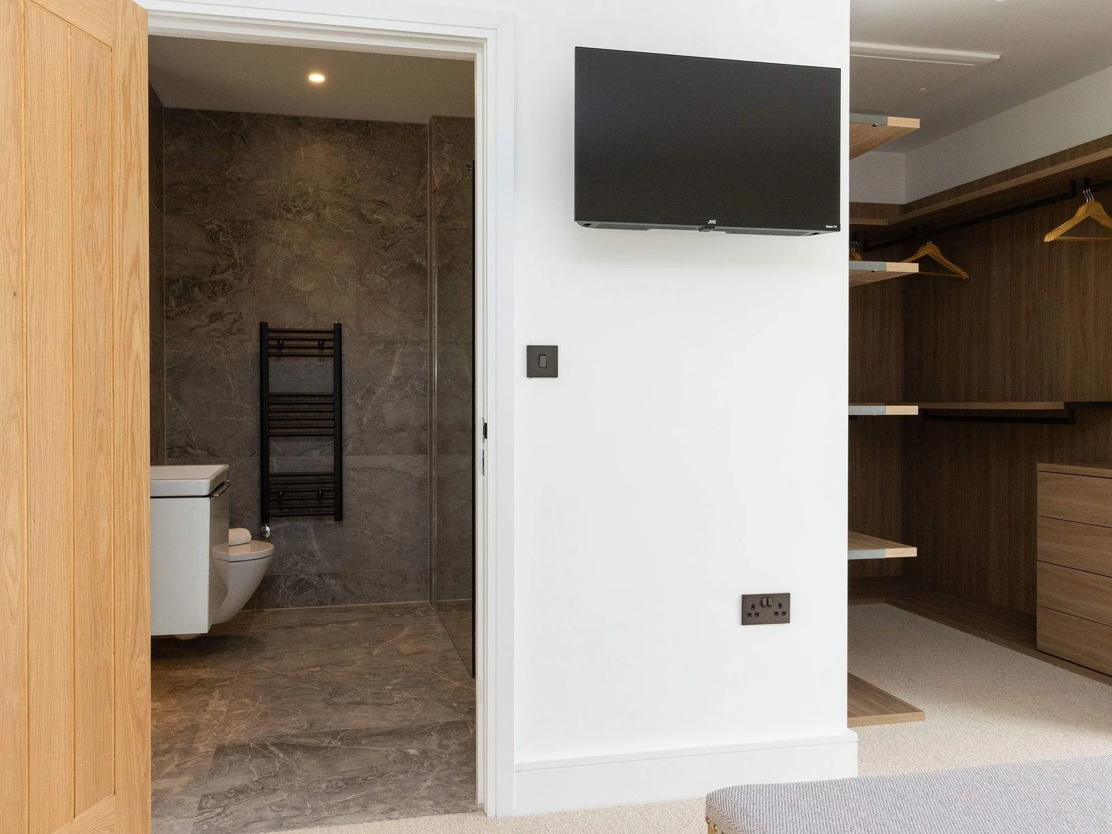 Bedroom with fitted wardrobe, TV and ensuite bathroom