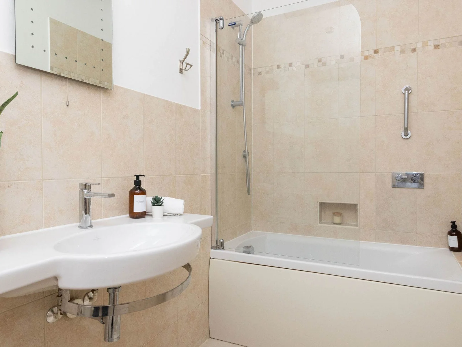 Ensuite with shower over bath.