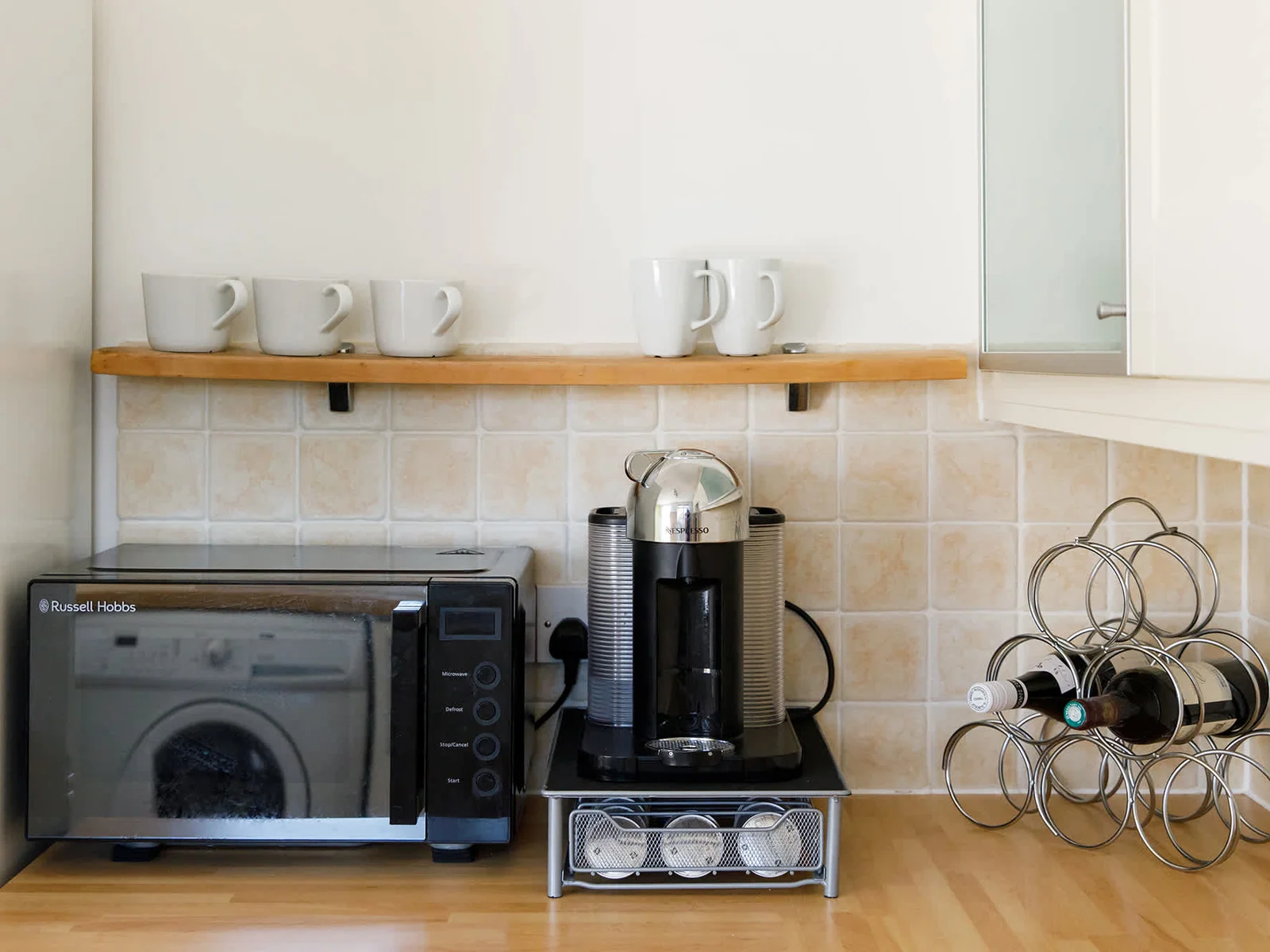 You'll find a coffee machine (Lavazza), microwave, fridge freezer and dishwasher.