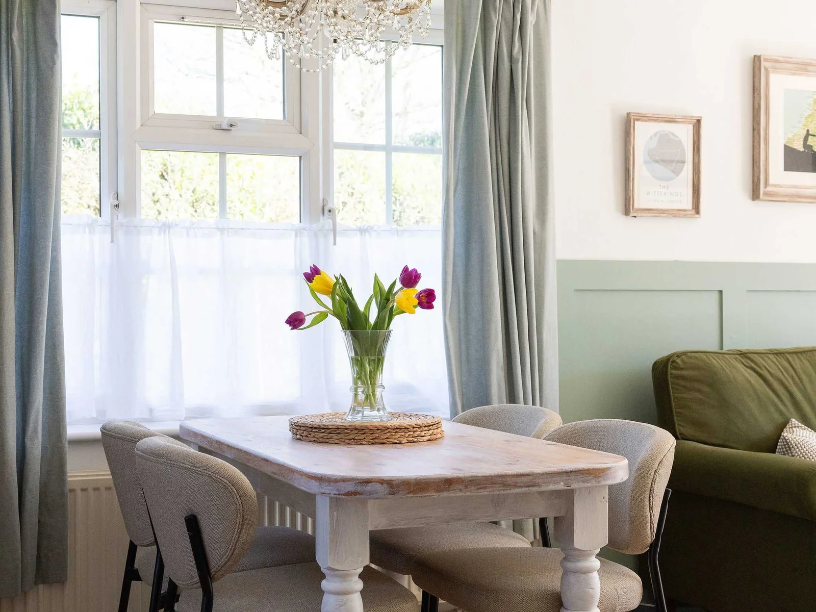 A bright dining space makes mornings easy and evenings feel relaxed after a day on the coast.