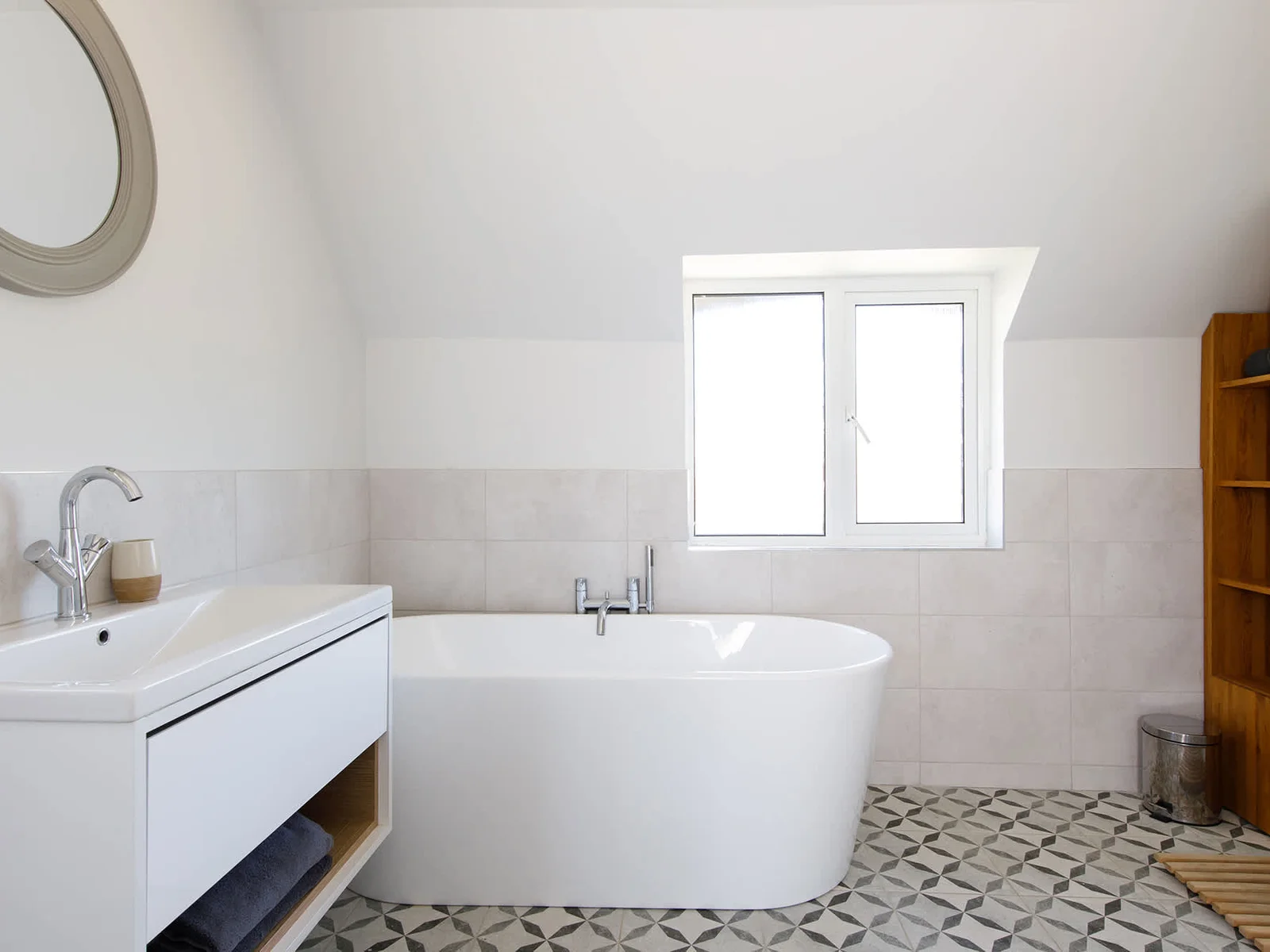 Enjoy long soaks in the stylish free-standing bath in the master ensuite.