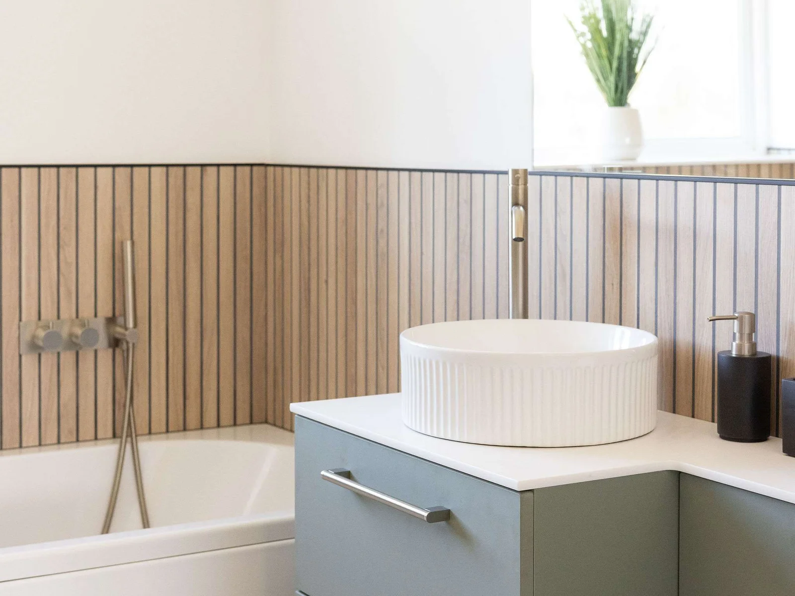 The vanity unit offers plenty of storage for your toiletries.