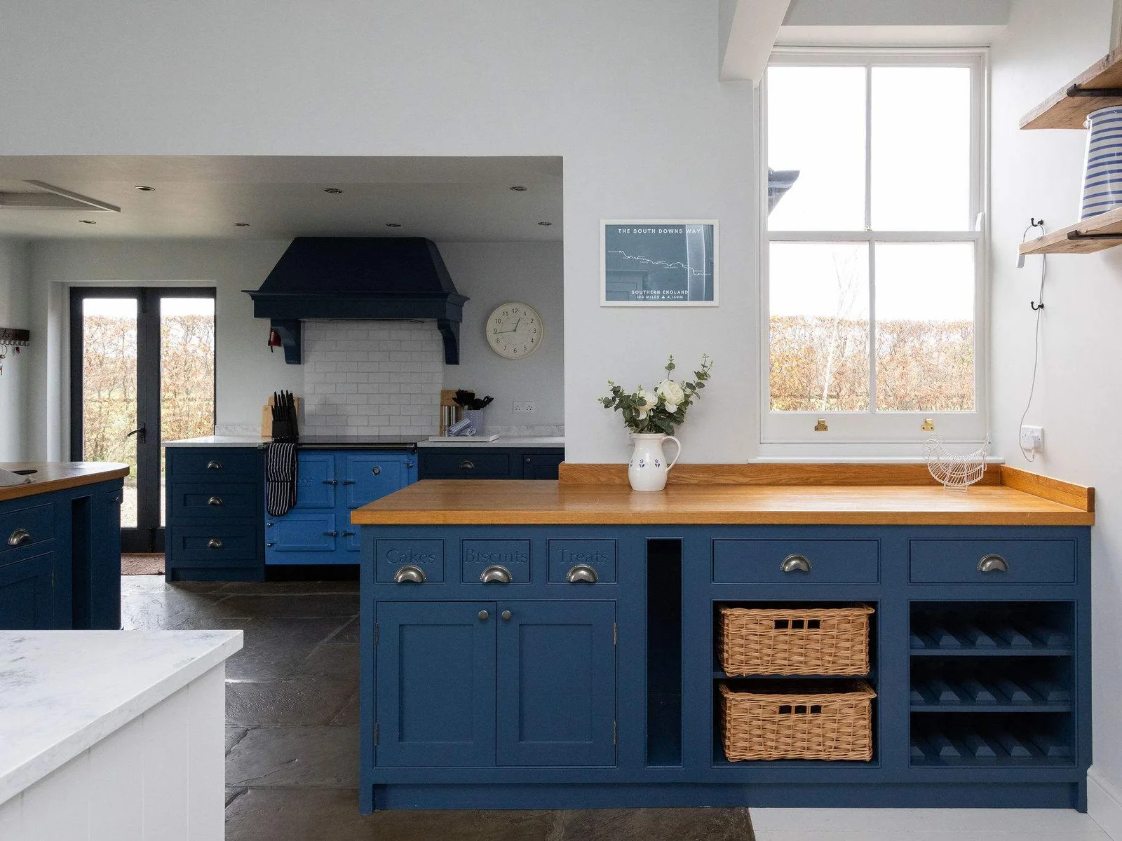 Stylish bespoke kitchen designed for relaxed group stays.