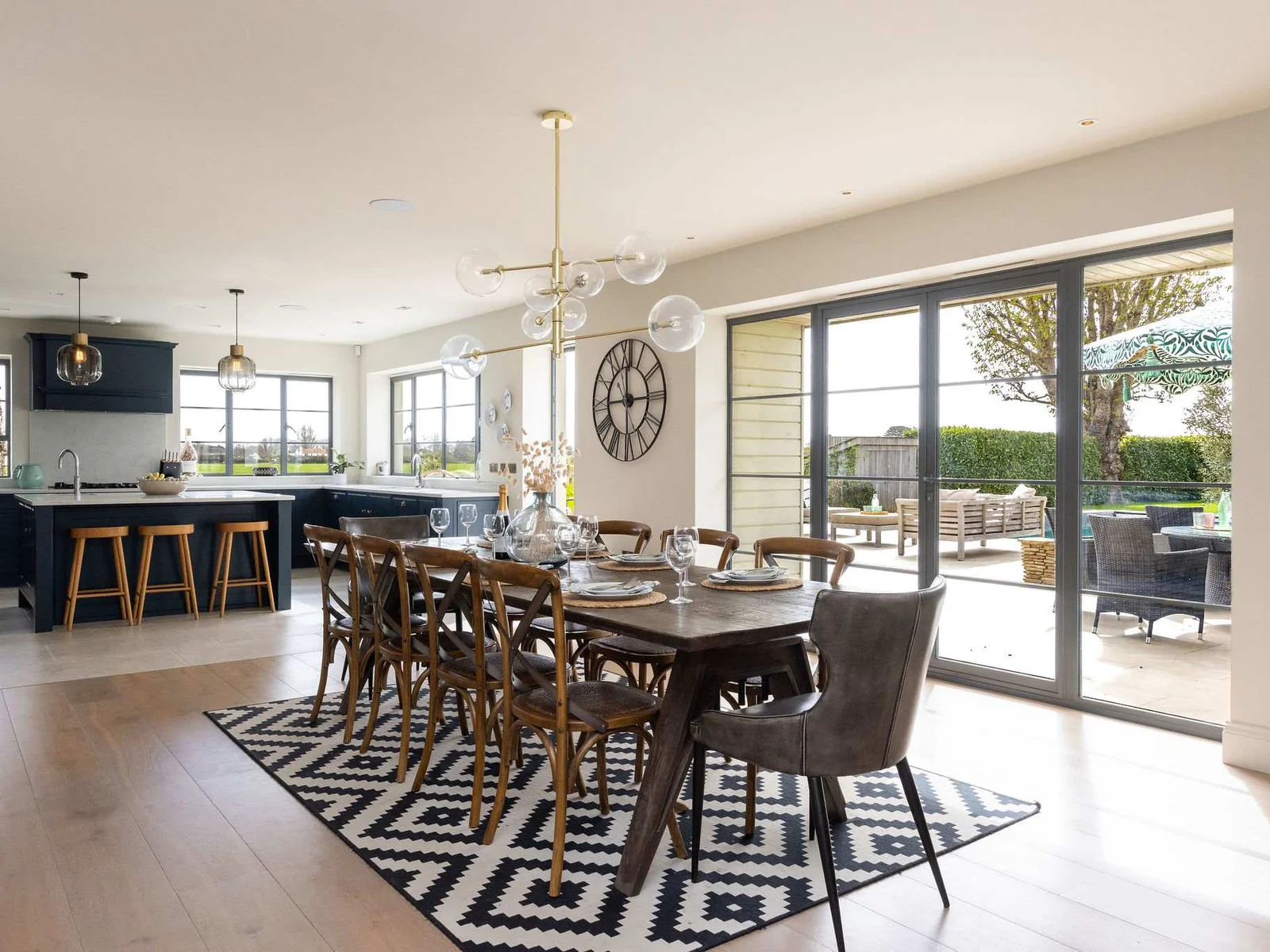 Open-plan dining flowing into the kitchen with direct garden access for relaxed entertaining.