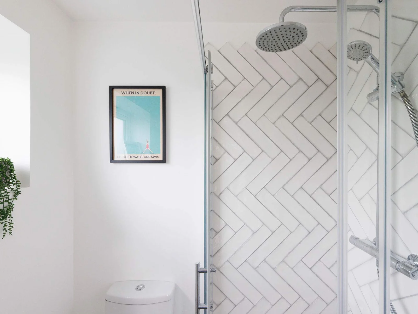 Relax in this overhead power shower after exploring the sights of Chichester.