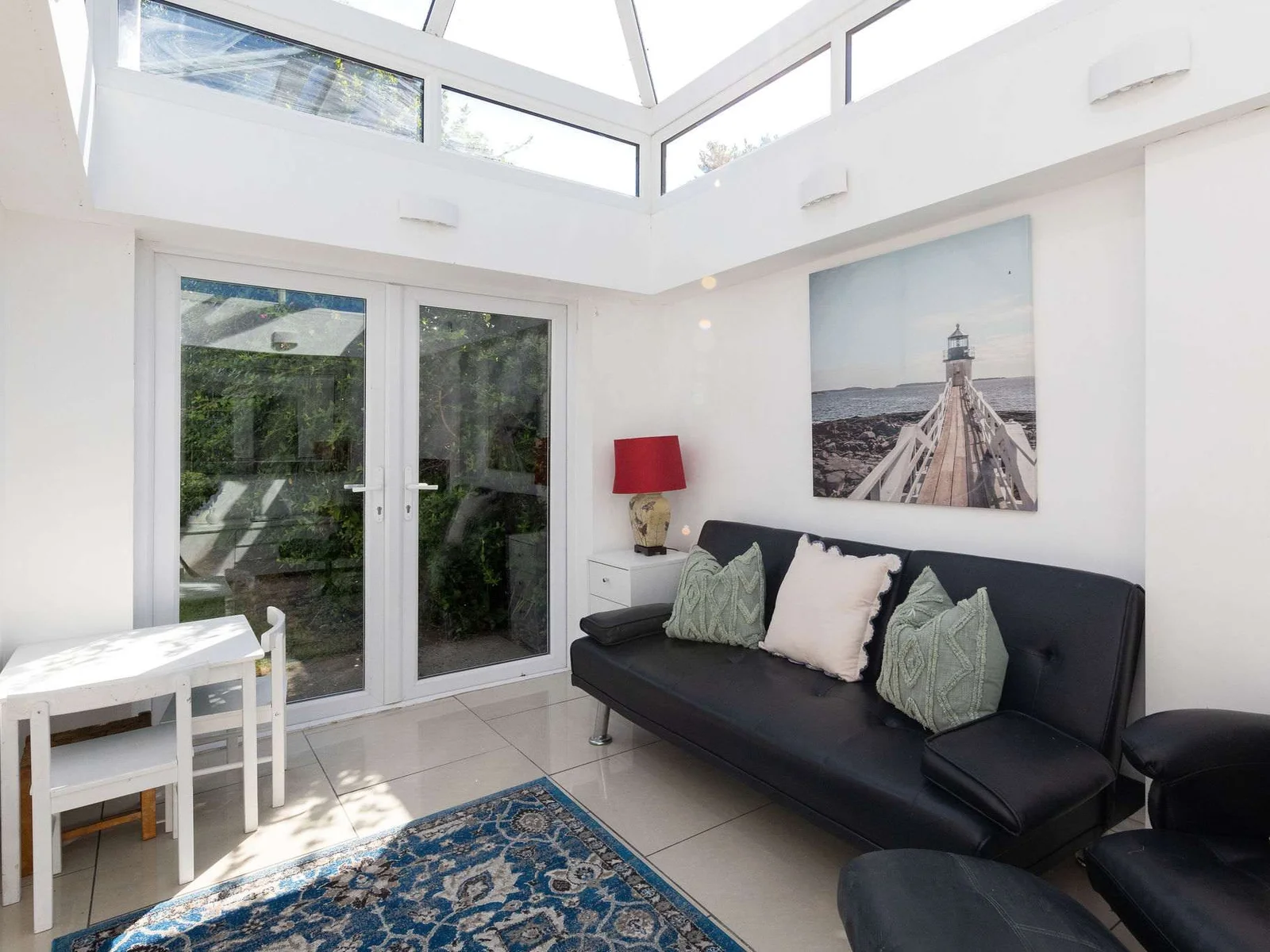 Relax in the bright, inviting conservatory of this peaceful coastal retreat with garden access.