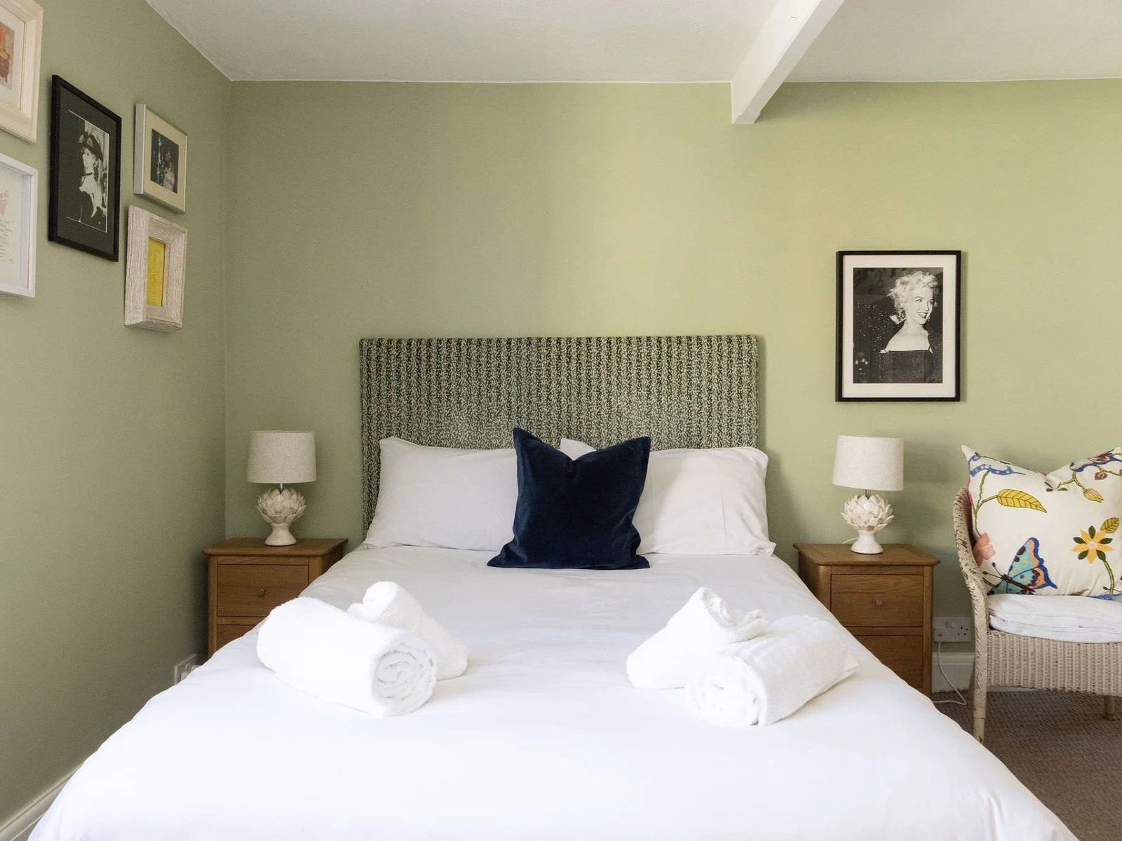 Peaceful first floor double bedroom with soft green tones