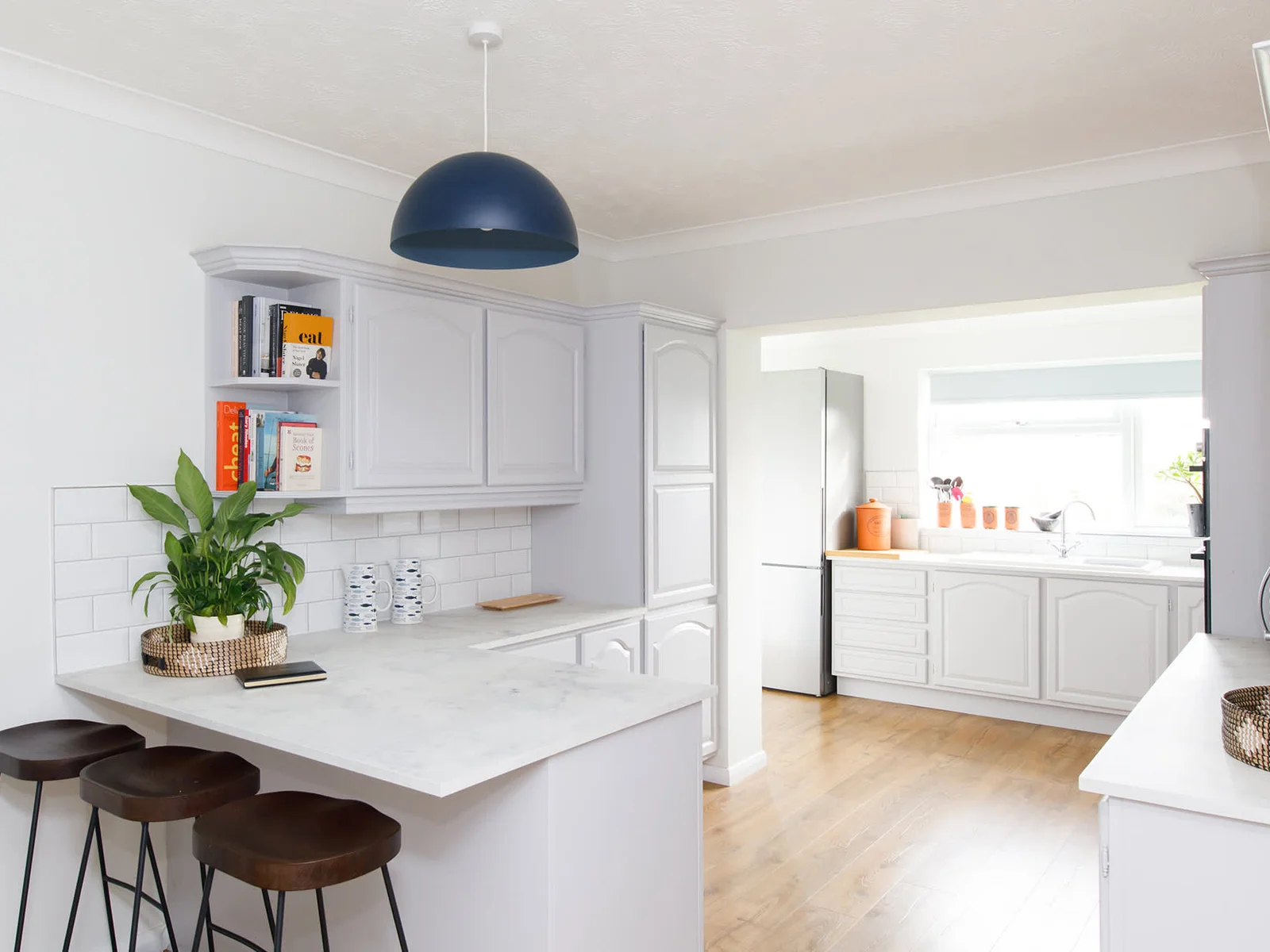 The light and airy kitchen has everything you need to prepare meals.