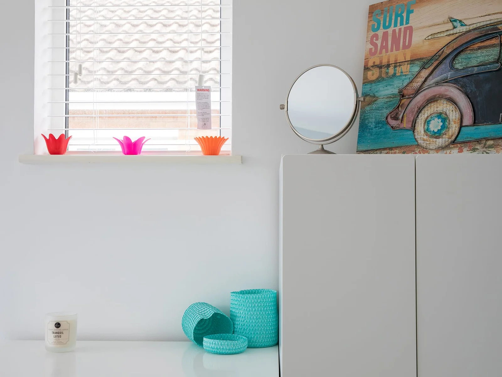 The monotone interior is tastefully accentuated by splashes of colour throughout.
