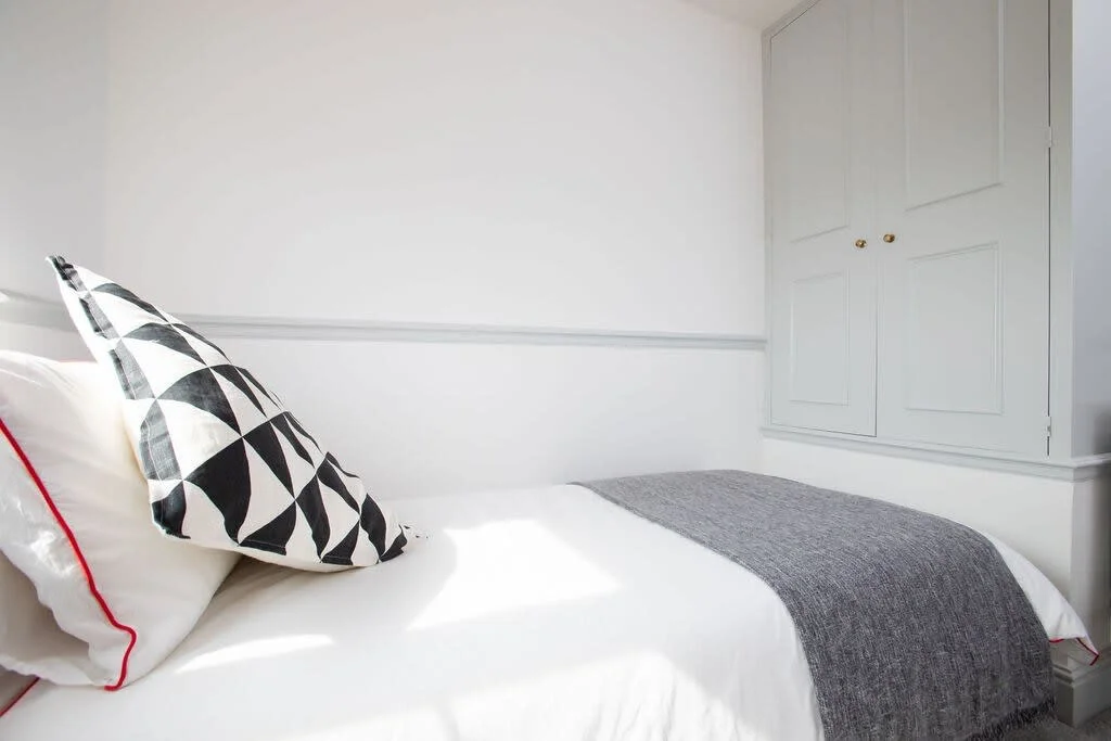 The single room offers another comfy bed.