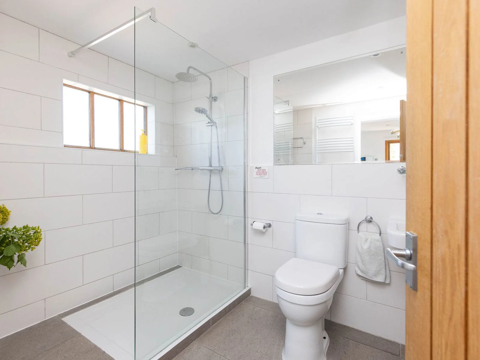 Modern bathroom with full amenities.