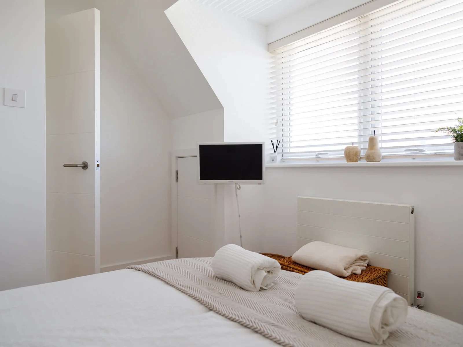 All three double bedrooms have flat-screen TVs