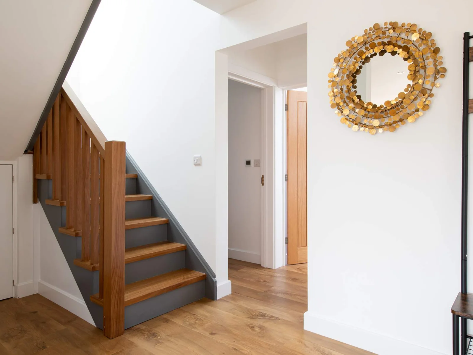 Climb up the stairs to reach the other two bedrooms