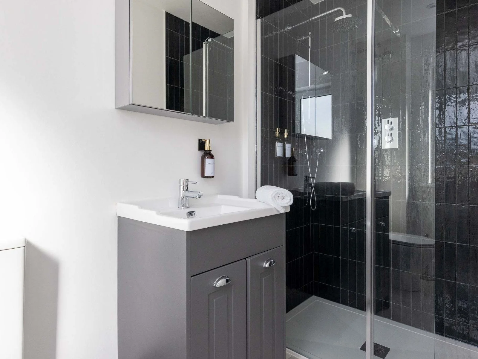 Refresh and unwind in the spacious, modern walk-in rainfall shower.