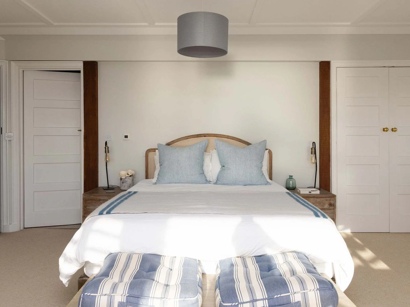 Spacious master king bed with wardrobes for your storing your personal belongings!